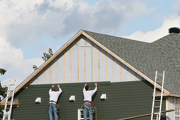 Professional Siding technician working in Northbrook, IL